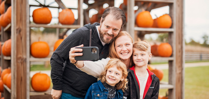 Family Taking Selfie At Farm